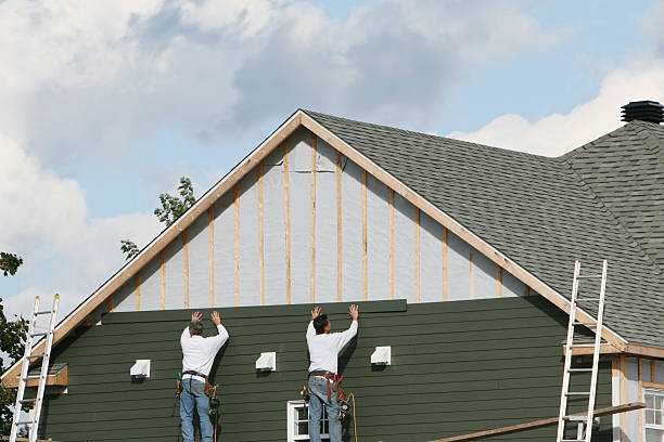 Professional Storm Damage Siding Repair technician working in Elkins Park, PA